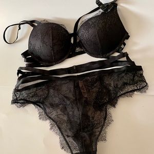 Victoria’s Secret Very Sexy Black Lace push-up bra and matching strappy panty.